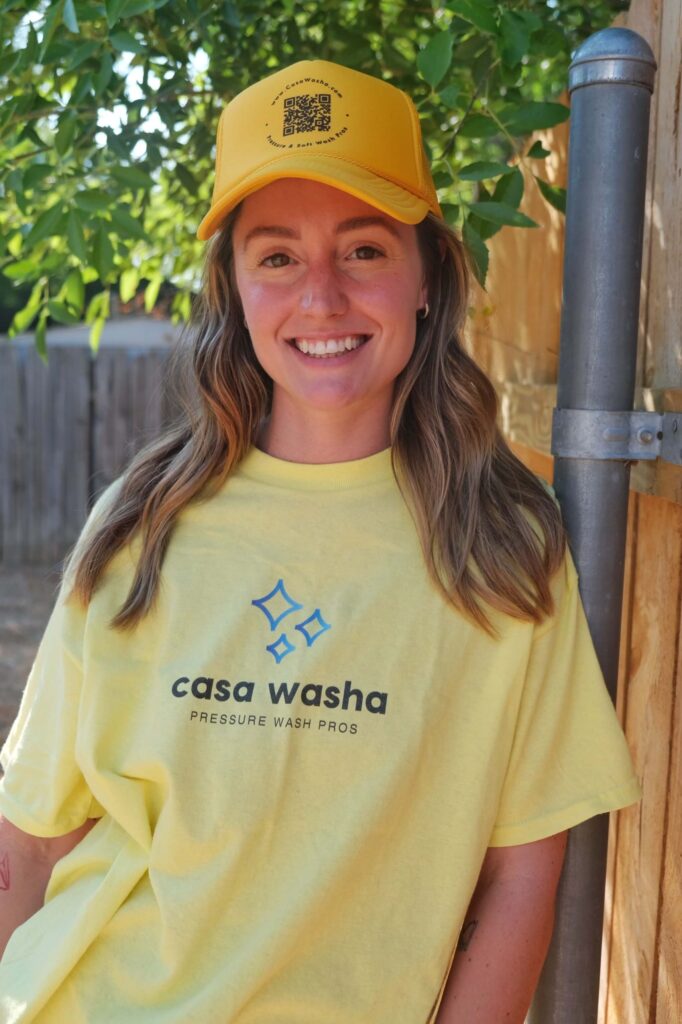 a woman wearing a yellow hat and a yellow t-shirt